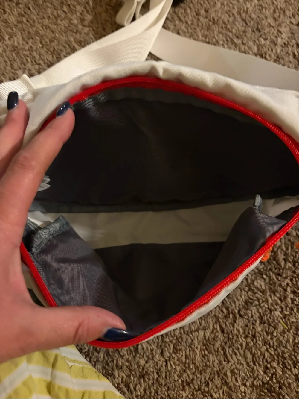 The North Face White Waist Pack with Orange Zippers